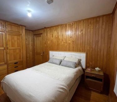 Ancud House | Habitación amplia, acogedora y cálida