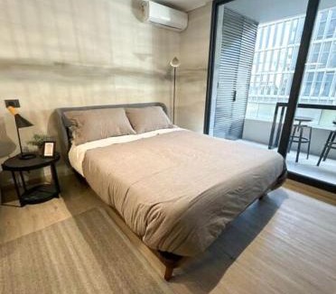 Las Condes Apartment | Moderno estudio con aire acondicionado y estacionamiento
