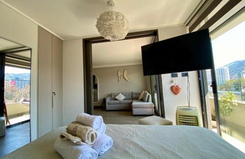 Las Condes Apartment | Vibe Oriente Spot Cama king Terraza y Piscina