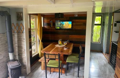 Pucon House | Natures Balcony Reclaimed Wood Cabin with Villarrica Volcano and Majestic Peak Views