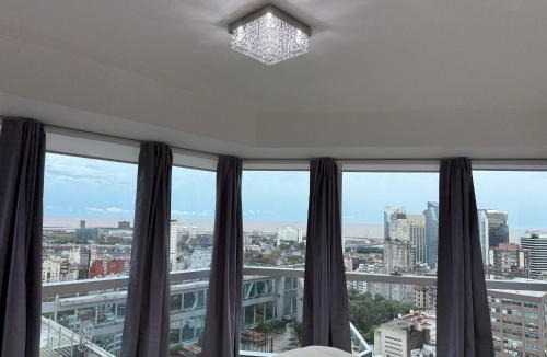 El Centro Apartment | Departamento Premium en la famosa Torre Bellini, en el centro, con piscina, jacuzzi, gimnasio y vista increible a la ciudad de Buenos Aires, capacidad máxima 5 personas