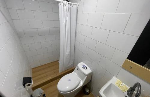 Curico House | Habitación doble en el centro con baño privado