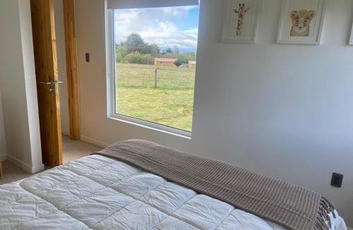 Punta Arenas House | Casa cálida vista al Estrecho y entorno natural