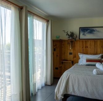 Pichilemu Cabin | Viento Sur Pichilemu Lodges Cama King con Calientacamas
