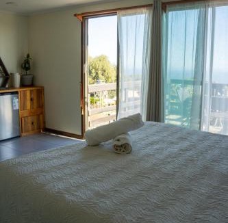Pichilemu Cabin | Viento Sur Pichilemu Lodges Cama King con Calientacamas