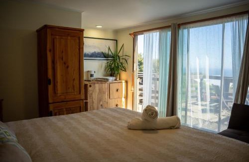 Pichilemu Cabin | Viento Sur Pichilemu Lodges Cama King con Calientacamas