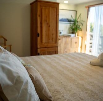 Pichilemu Cabin | Viento Sur Pichilemu Lodges Cama King con Calientacamas
