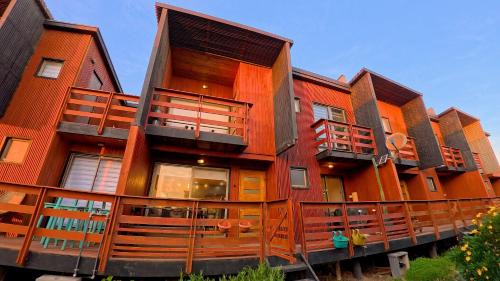 Pichilemu House | Casa 38 en Condominio Piscina climatizada 5 pax