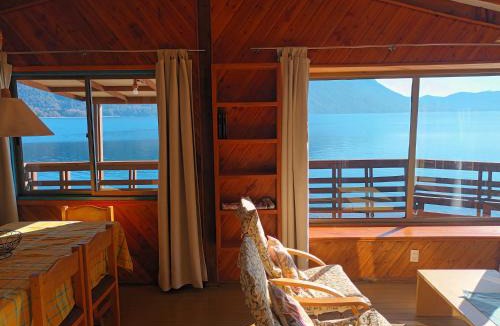 Caburgua Apartment | Cabaña Celeste - Acceso directo a playa lago Caburgua y cancha de tenis - direct access Beach in Caburgua Lake and tenis court