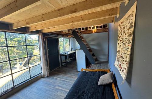 Melipeuco House | Cabaña con terraza vista al río en Roca Truful