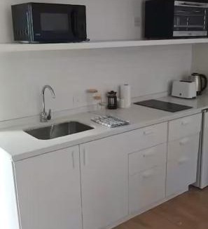 Macrozona Bahia Redonda y Primeros Faldeos Apartment | Estudio con calefacción central, a 1 cuadra centro