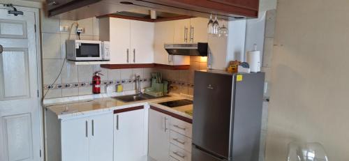 Cavancha Apartment | Iquique - Departamento ubicado frente a la Playa - Incluye Estacionamiento, Puesta de Sol y Mar - Reserva mínima 2 Noches