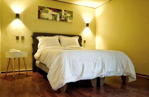 Curico Hotel | R Suites