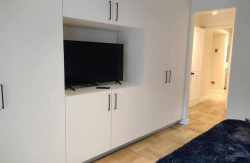 El Golf Apartment | Jardín privado para familias y trabajo