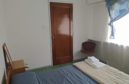 Historic Center House | Habitaciones con baño compartido en Departamento Mid Century Modern