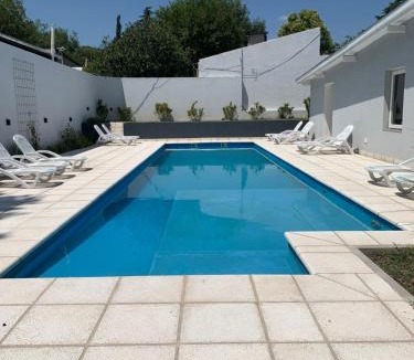 La Falda Apartment | Villa Edén Departamento 1 Dormitorio con Cochera