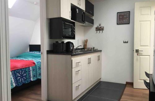 Pudahuel Hotel | Comfortable and beautiful apartments fully equipped with private bathroom and kitchen