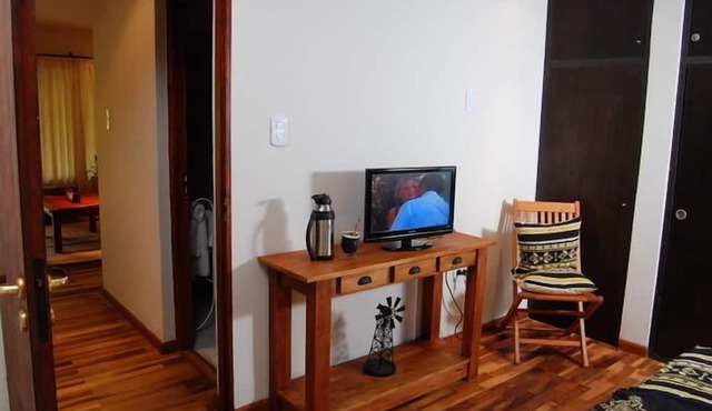 Rio Arriba Suites Apartments y Resto