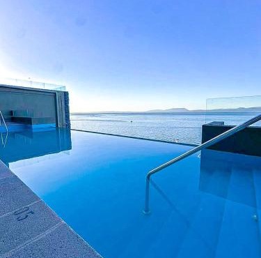 HOM I Dpto Frente al Lago Calefacción Piscina Gym Sauna Estacionamiento Muelle privado