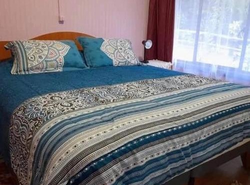 Cabaña Altos de Parra Tome - Quincho estufa leña in Tomé